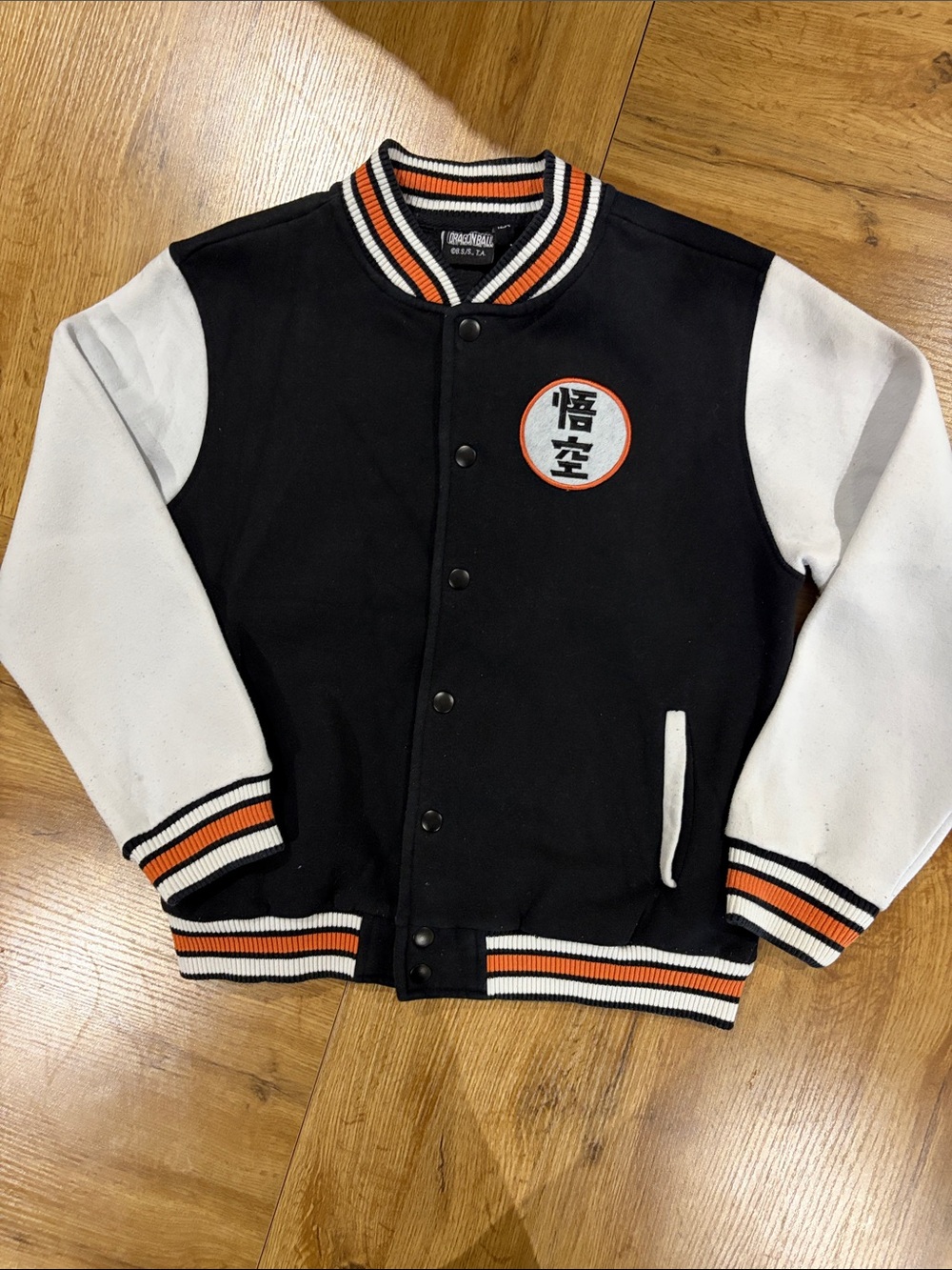 Kids Black and White Varsity Jacket with Orange Trim - Goku Inspired